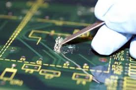 instrument removal of conformal coatings
